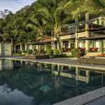 Impressive 7 bedroom Thai sea view villa, located on the mountainside, north of Patong, with direct west coast views across the bay to the horizon.