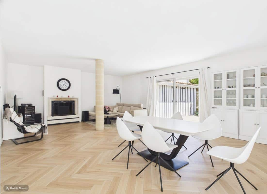 Intérieur d’une maison à Bordeaux Intérieur d'une maison à vendre à Bordeaux, avec salon lumineux et salle à manger moderne.