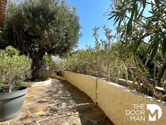 Terrace of a house with plants and sunshine, Le Lavandou.