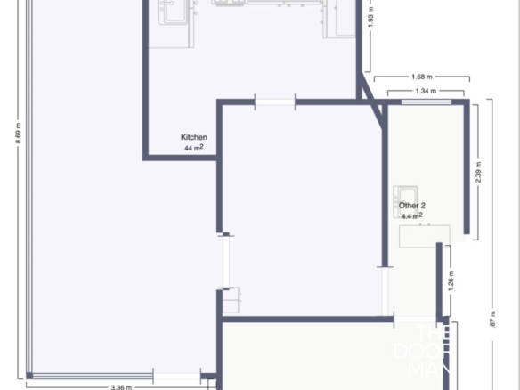 Plan d'un immeuble à vendre avec plusieurs appartements, incluant une cuisine spacieuse.