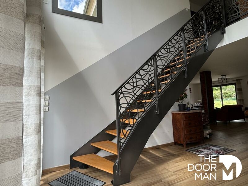 Staircase in a contemporary house Modern wooden and metal staircase in a contemporary house.