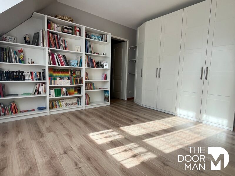 Interior of a house in Limours Interior of a house with built-in library and closets, natural light