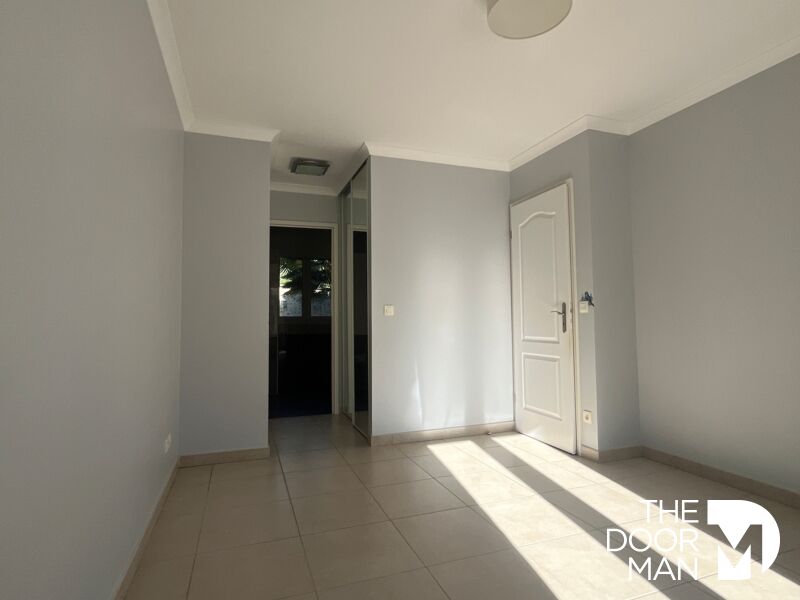 Interior of a house in Limours Interior of a house in Limours, bright room with tiled floors and light-colored walls.