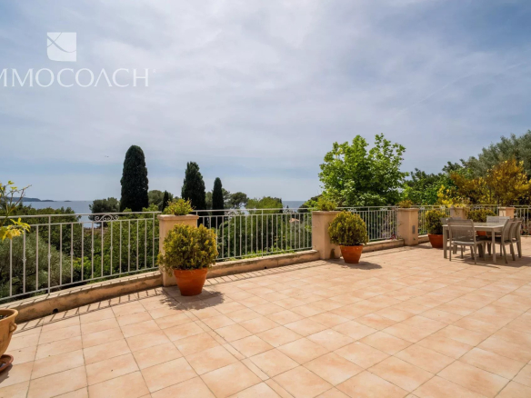 Spacious terrace with sea and garden views in Carqueiranne.