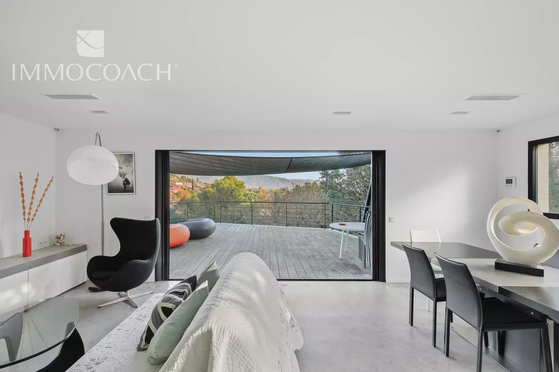 Interior of a villa in Bormes-les-Mimosas Modern interior of a villa with views of the terrace and surrounding landscape in Bormes-les-Mimosas.