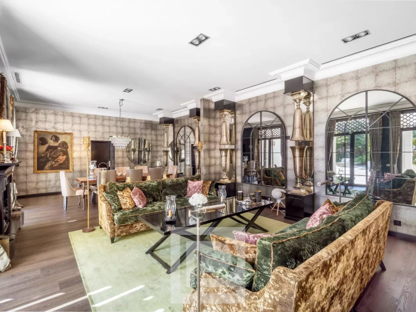 Interior of an artist's house in Cannes with an elegant living room and baroque decorations.
