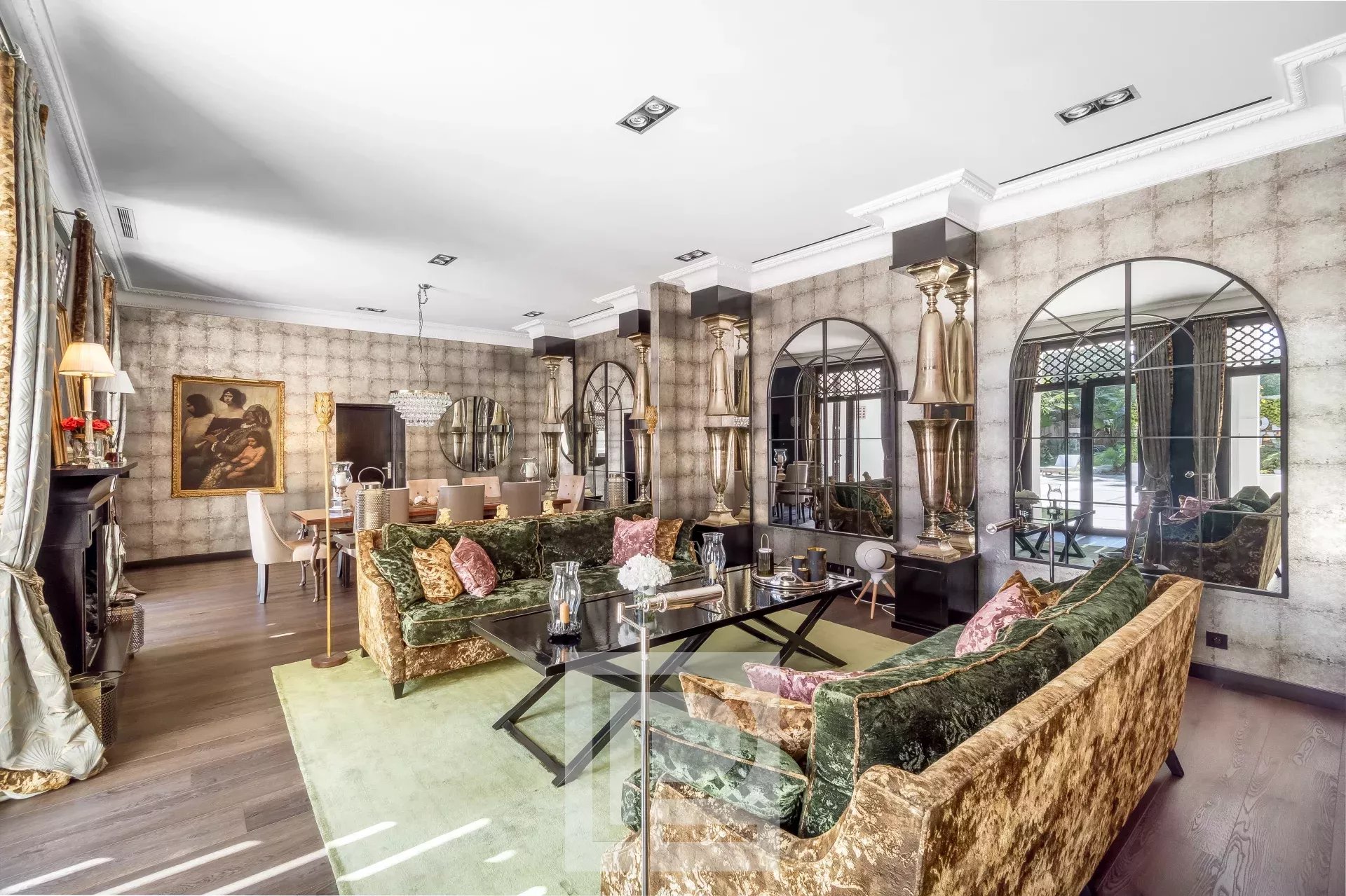 Interior of an artist's house in Cannes with an elegant living room and baroque decorations.