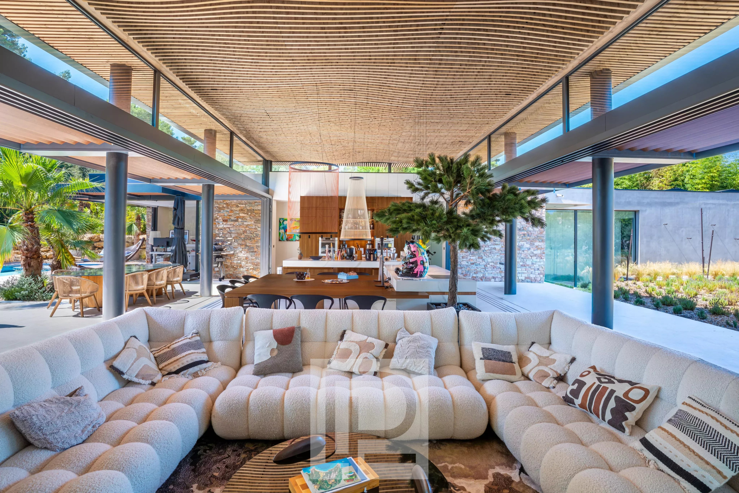 Contemporary villa in Mougins Interior of a contemporary villa with a spacious living room and open kitchen, Mougins.