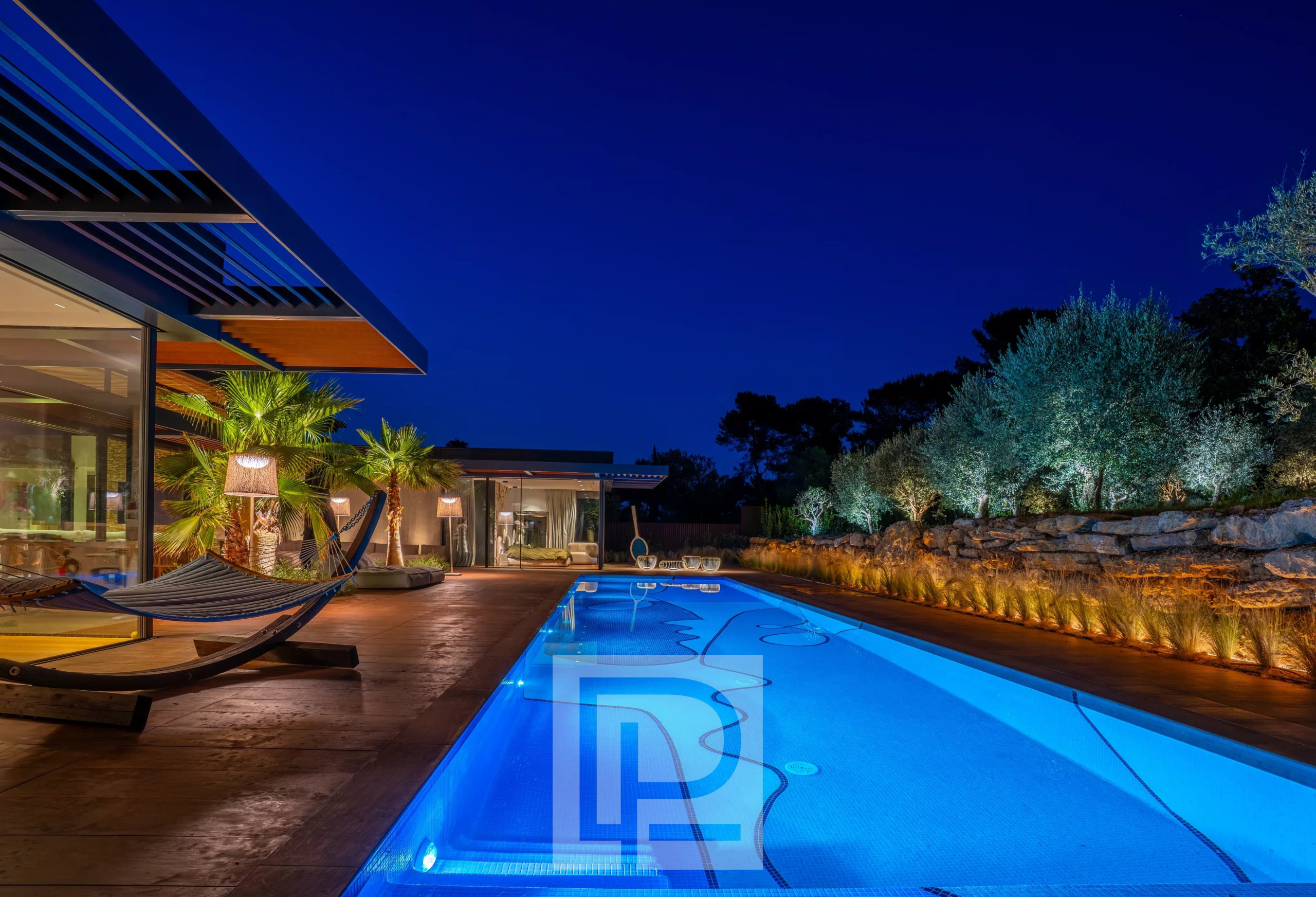 Contemporary property in Mougins Contemporary villa with illuminated swimming pool in a private estate in Mougins.