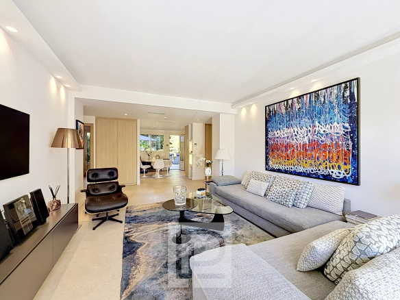Bright living room in a renovated apartment in Cannes with modern decor and access to the garden