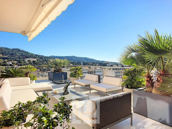 Apartment terrace with unobstructed views, modern furniture and greenery, Le Cannet.
