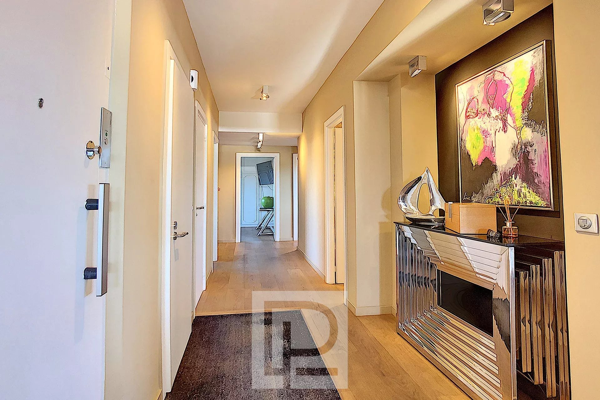 Modern apartment hallway in Le Cannet Interior of a modern apartment with hallway and elegant decor.