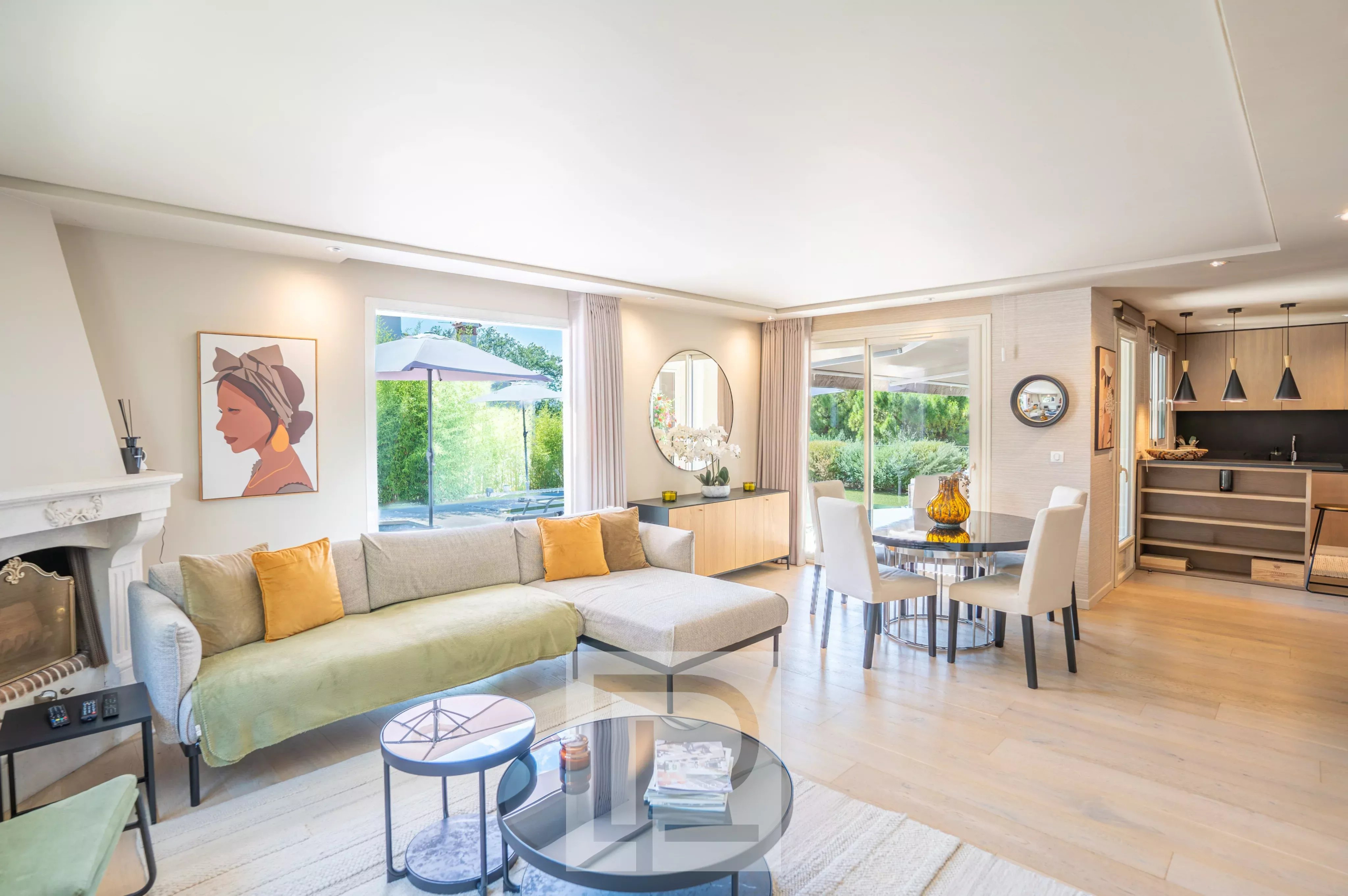 Interior of a Provençal villa in Mougins Interior of a renovated Provençal villa with a bright living room and modern furniture.