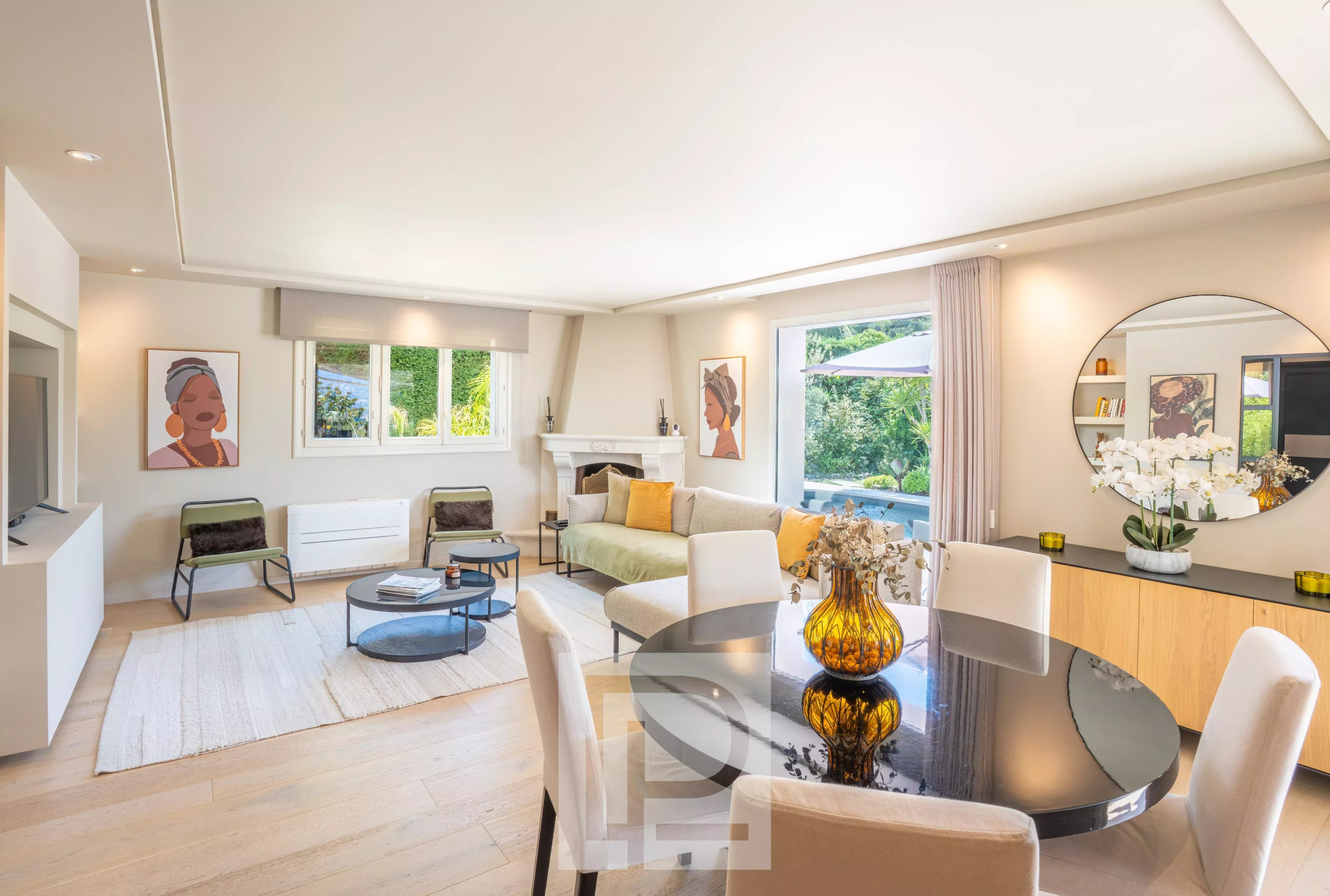 Interior of a Provençal villa Interior of a renovated Provençal villa with a bright living room and a fireplace in Mougins.