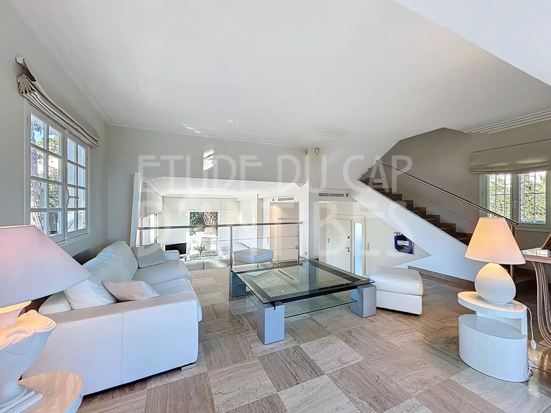 Living room of the villa in Cap d'Antibes Interior of a modern villa with spacious living room and natural light, Cap d'Antibes.