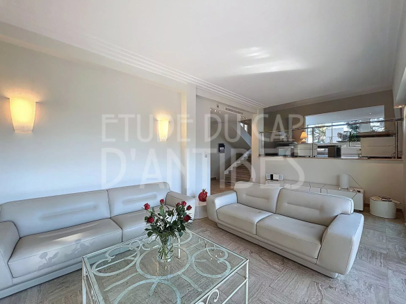 Interior of a villa in Antibes with a bright living room and modern furniture.