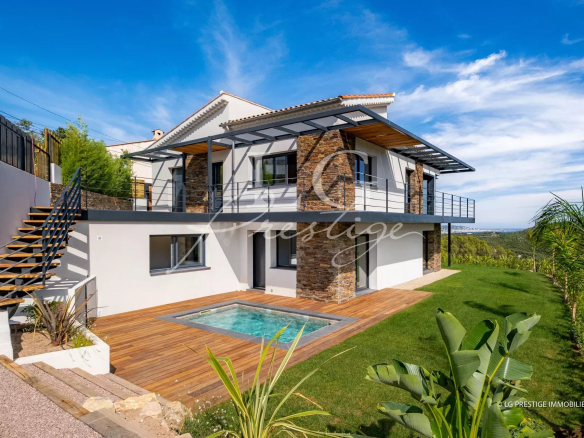 Contemporary villa with sea view and outbuilding