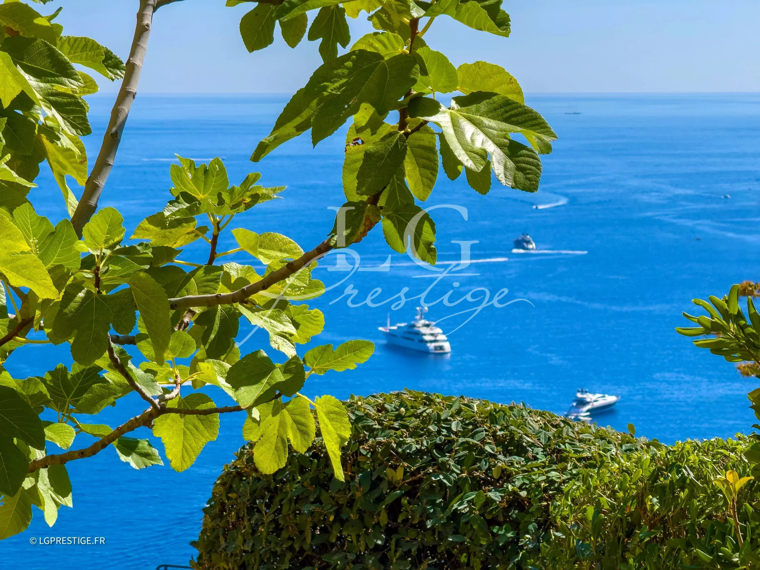 Sea view from a villa in Théoule-sur-Mer Panoramic view of the Mediterranean Sea from a villa in Théoule-sur-Mer, with yachts in the distance.