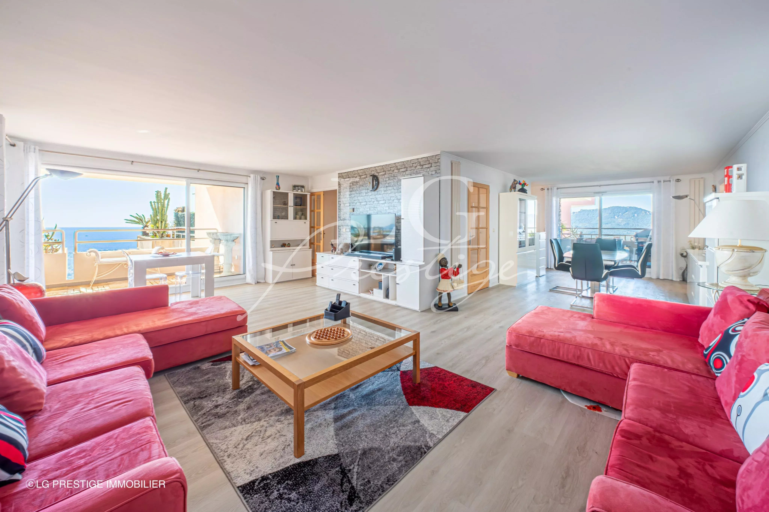 Apartment with sea view in Mandelieu-la-Napoule Spacious living room of an apartment with sea view in Mandelieu-la-Napoule, modern and bright furniture.
