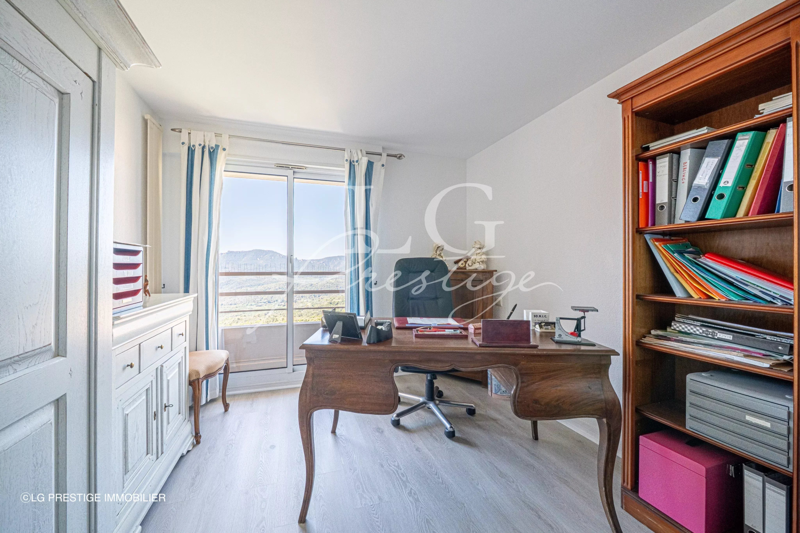 Office with sea view Office in an apartment with sea view, modern furniture and storage.