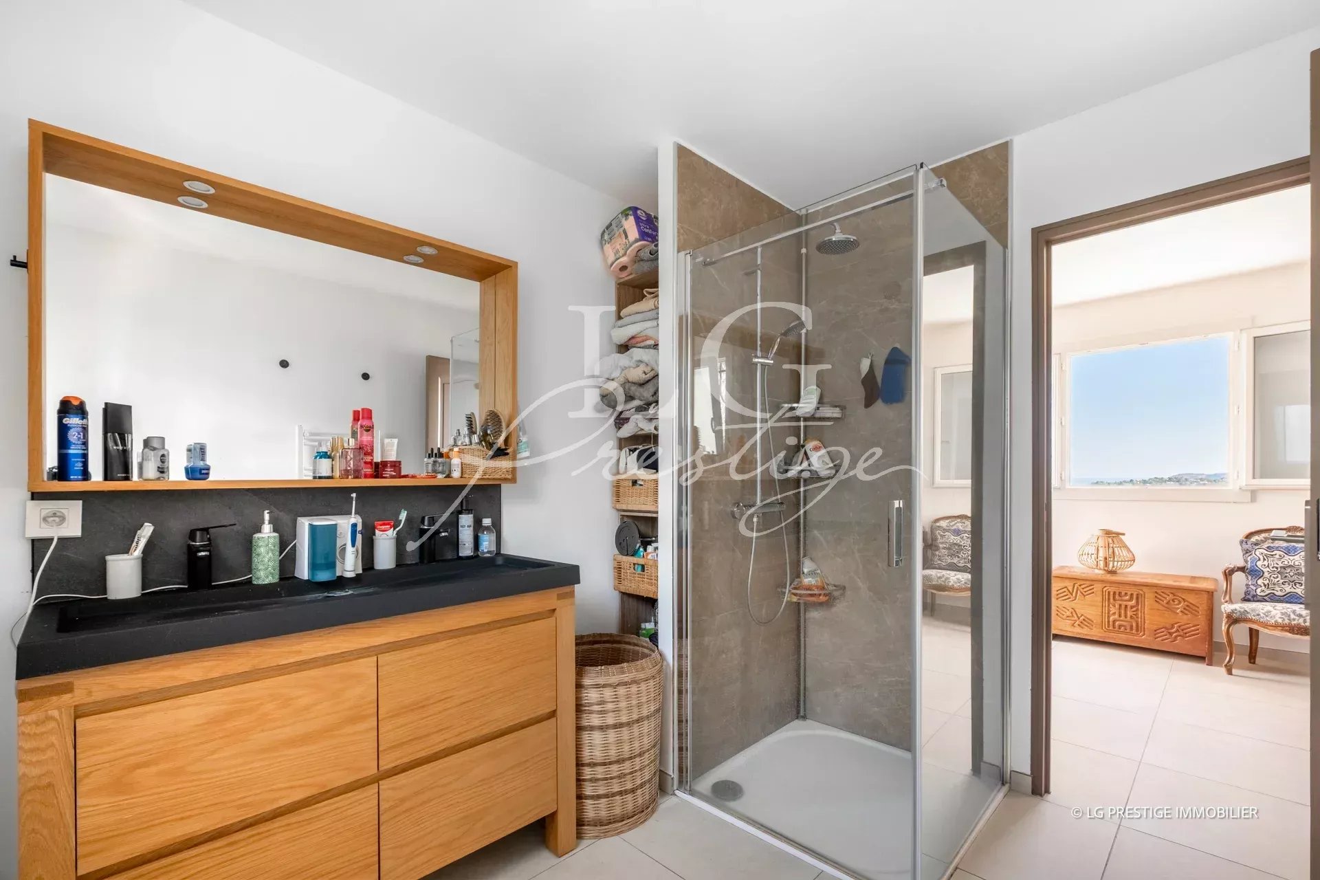Contemporary bathroom Modern bathroom with shower, mirror and wooden furniture.