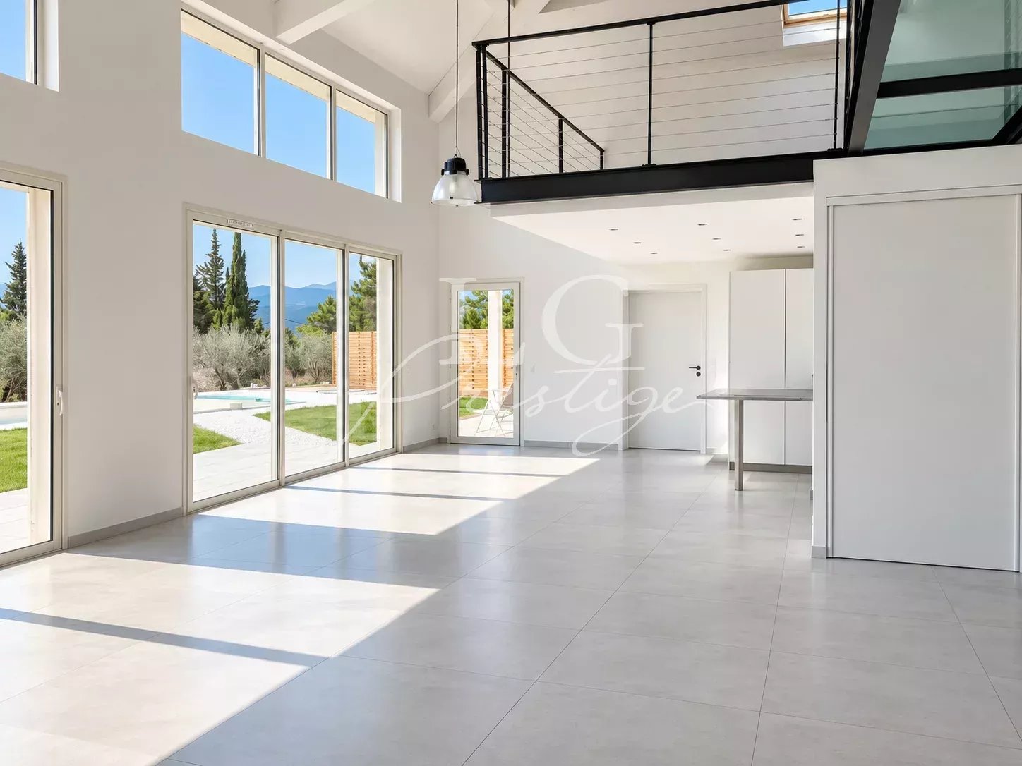 Interior of a contemporary villa in Montauroux Interior of a contemporary villa with large windows and mezzanine, Montauroux.