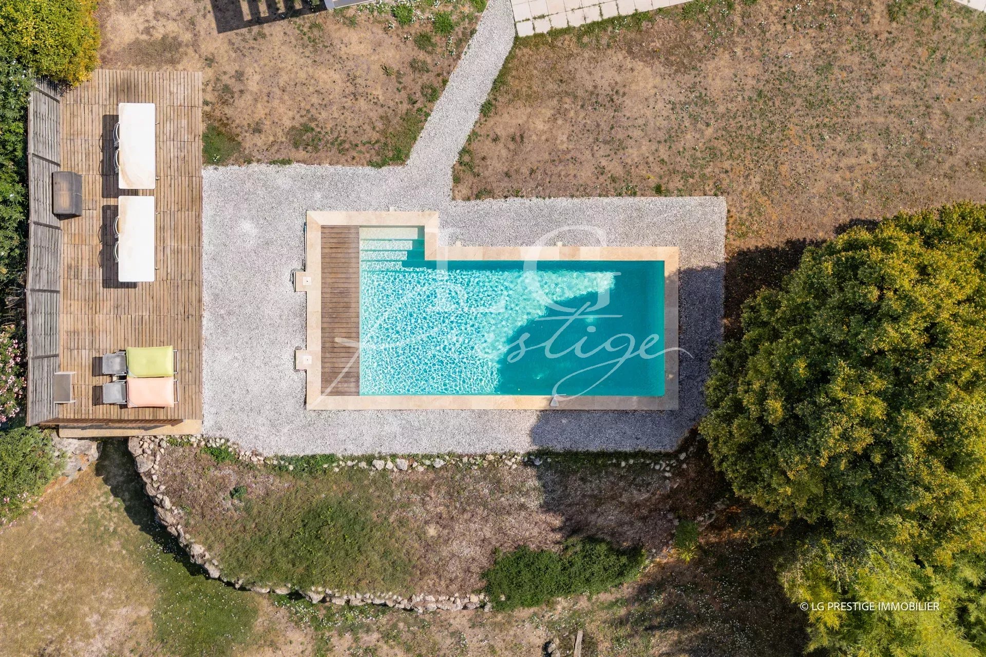Contemporary villa with swimming pool in Montauroux Aerial view of a swimming pool surrounded by garden in a contemporary villa in Montauroux.