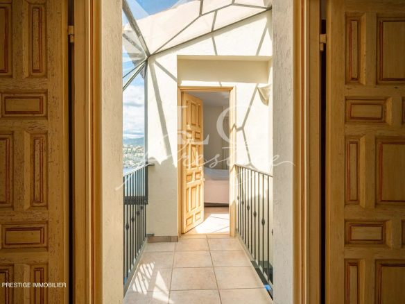 Interior of a villa in Théoule-sur-Mer with a view of the Bay of Cannes.