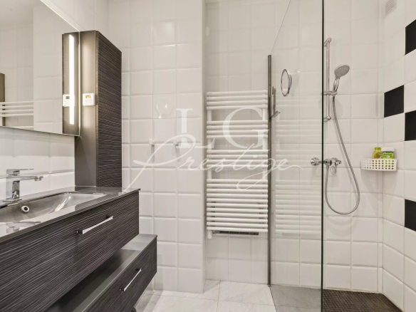 Modern bathroom with shower and sink in an apartment in Mandelieu-la-Napoule.