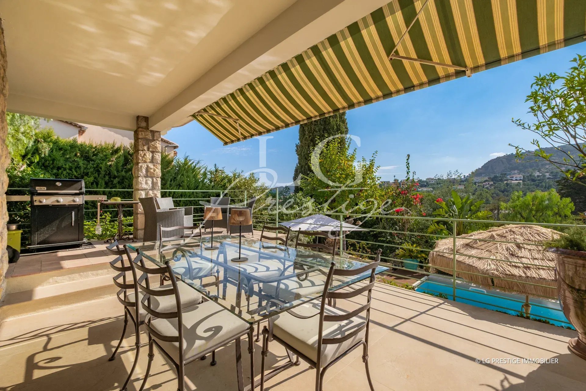 Villa terrace in Mandelieu-la-Napoule Villa terrace with view, table and chairs, barbecue, swimming pool nearby.