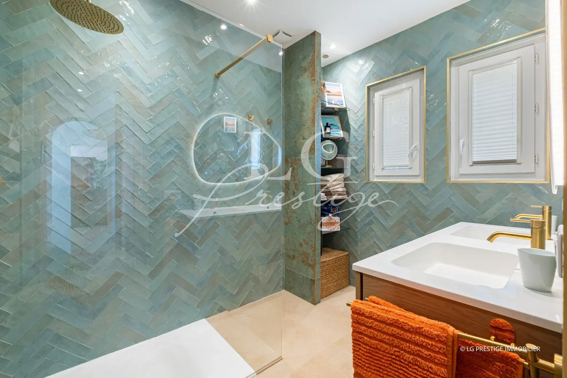 Renovated bathroom Modern bathroom with mosaic tiles and double sink.
