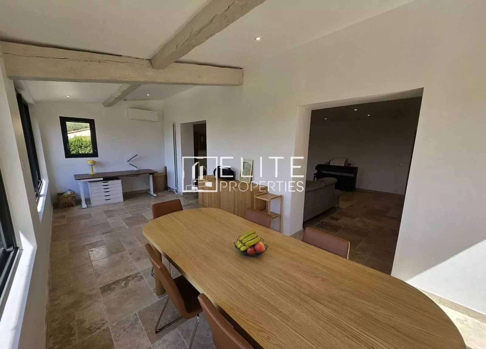 Interior of a house in Cabris with a bright dining room and modern furniture.