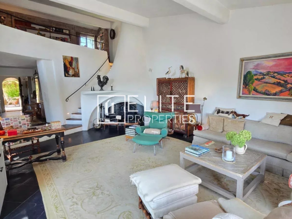 Interior of a 5-room house with a bright living room and fireplace.