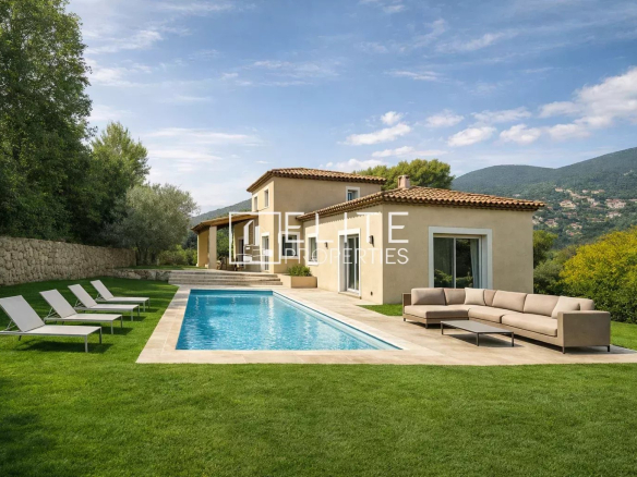 Mason's villa with swimming pool in Grasse, overlooking garden and mountains.