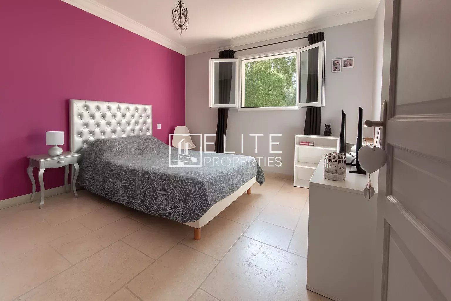 Room in a villa in Grasse with pink walls and a double bed