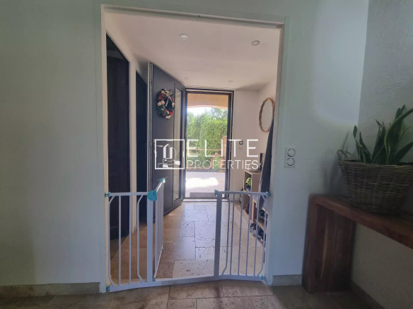 Interior of a villa in Fayence with an entrance and a security barrier.