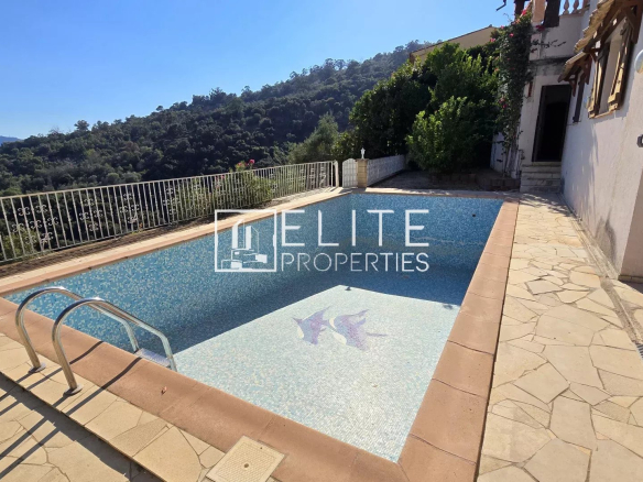 Swimming pool at a house with sea views in Mandelieu-la-Napoule.