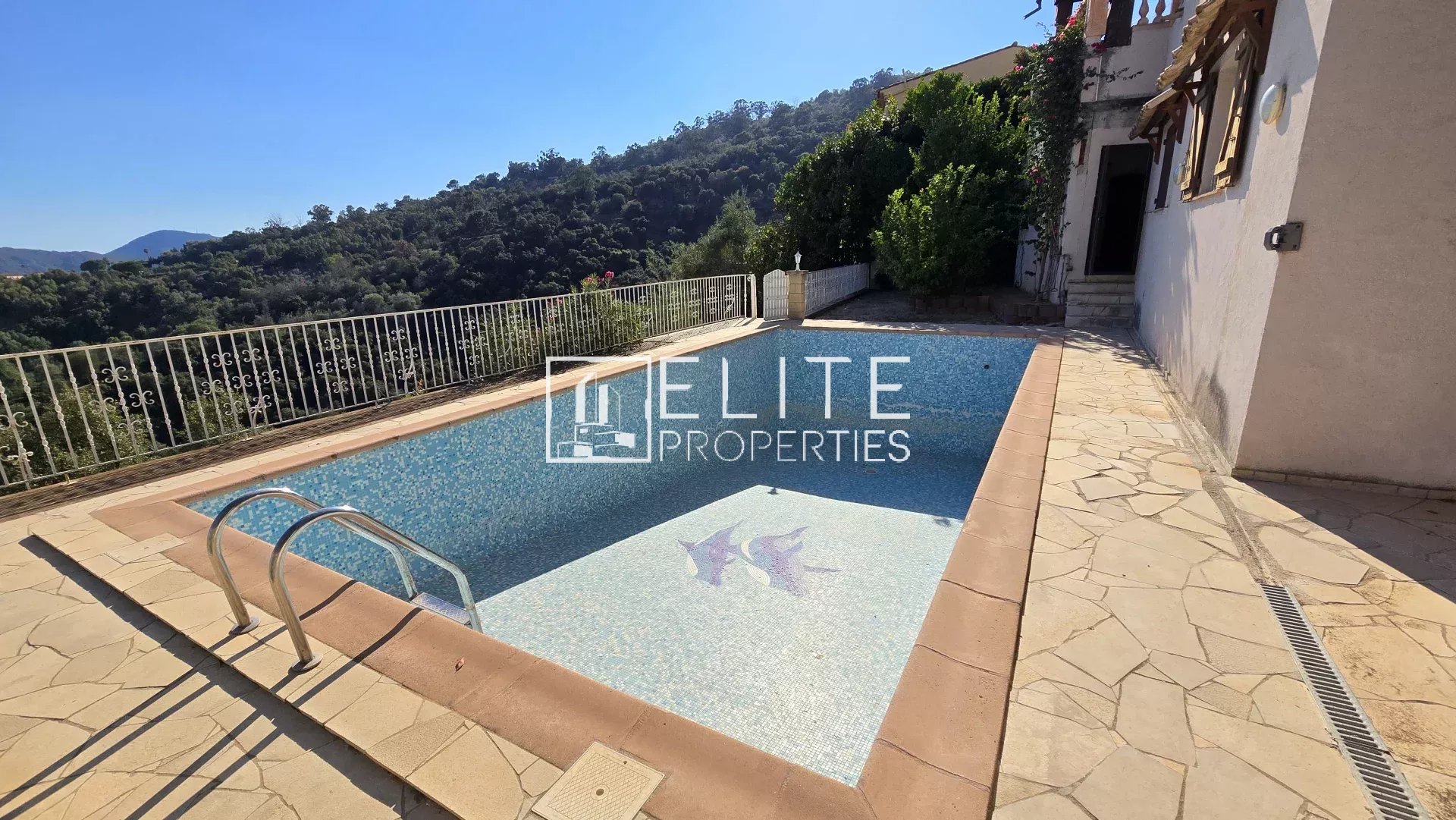 House with pool and sea view in Mandelieu-la-Napoule Swimming pool at a house with sea views in Mandelieu-la-Napoule.