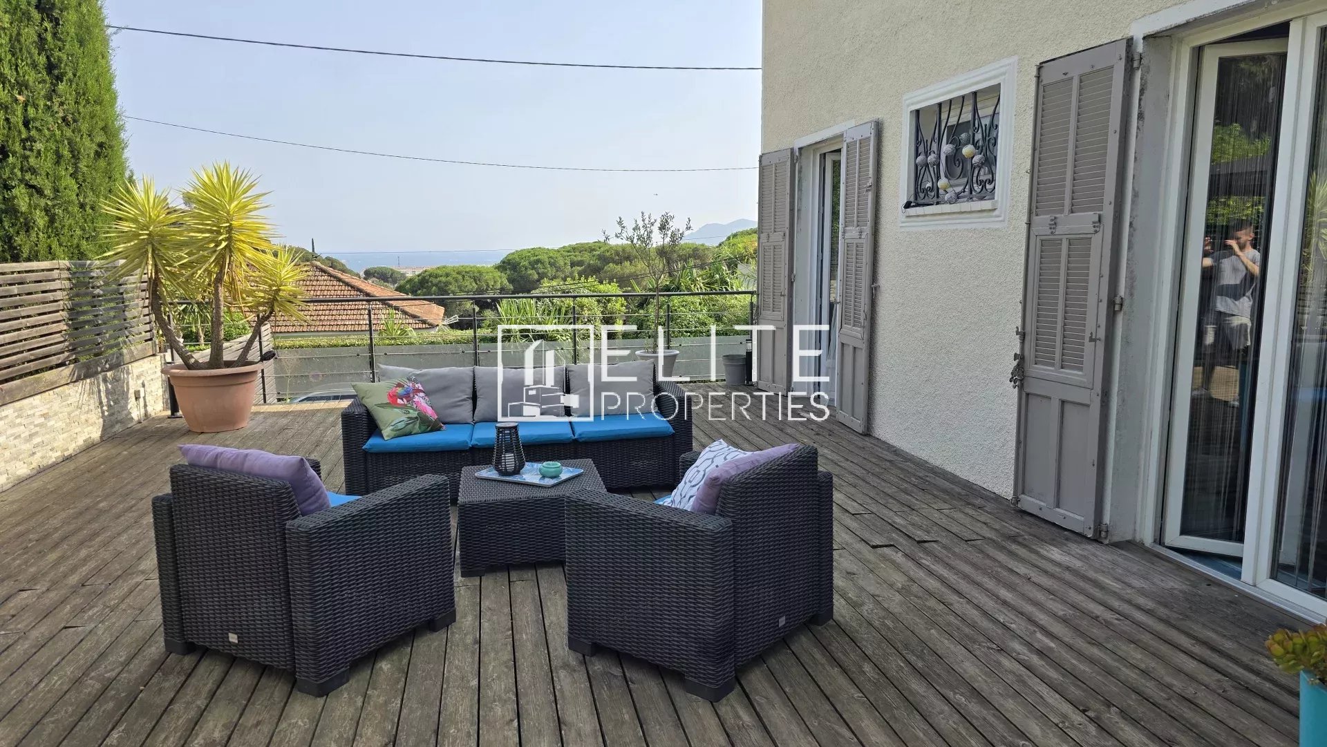 Terrace with sea view in Cannes Wooden terrace with garden furniture and sea view in Cannes La Bocca.