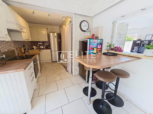 Modern kitchen with bar and equipment, house in Cannes La Bocca.