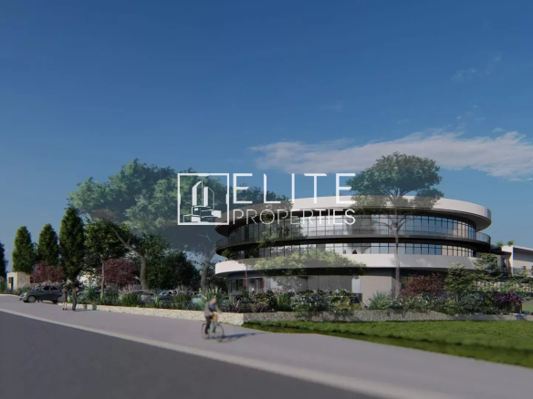 Vue d'un projet commercial à Grasse avec un bâtiment moderne et un espace vert.
