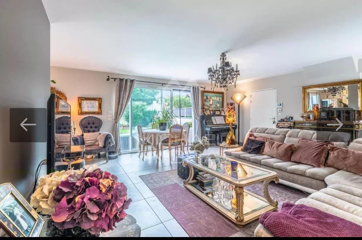 Bright 4-room apartment in Anglet Interior of a bright 4-room apartment with living room, modern furniture and access to the garden.