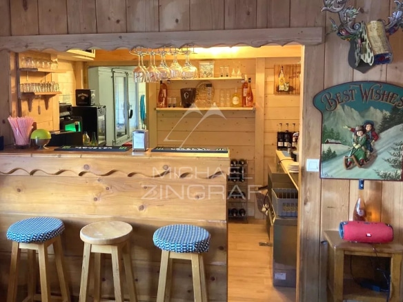 Wooden bar in a hotel with Savoyard decor in Combloux