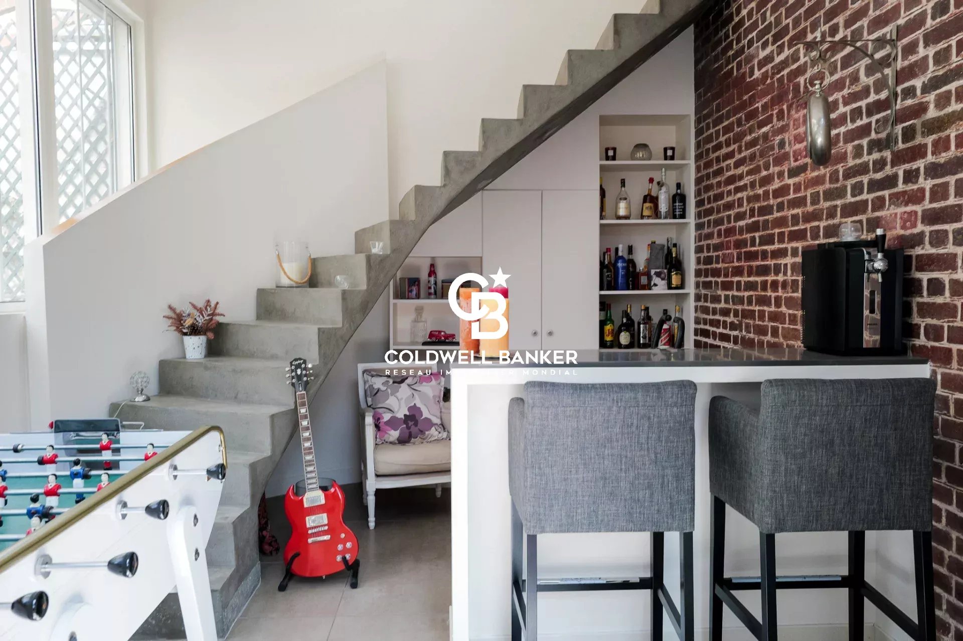 Interior of a characterful house in Suresnes Interior of a characterful house with modern staircase and bar, Suresnes.