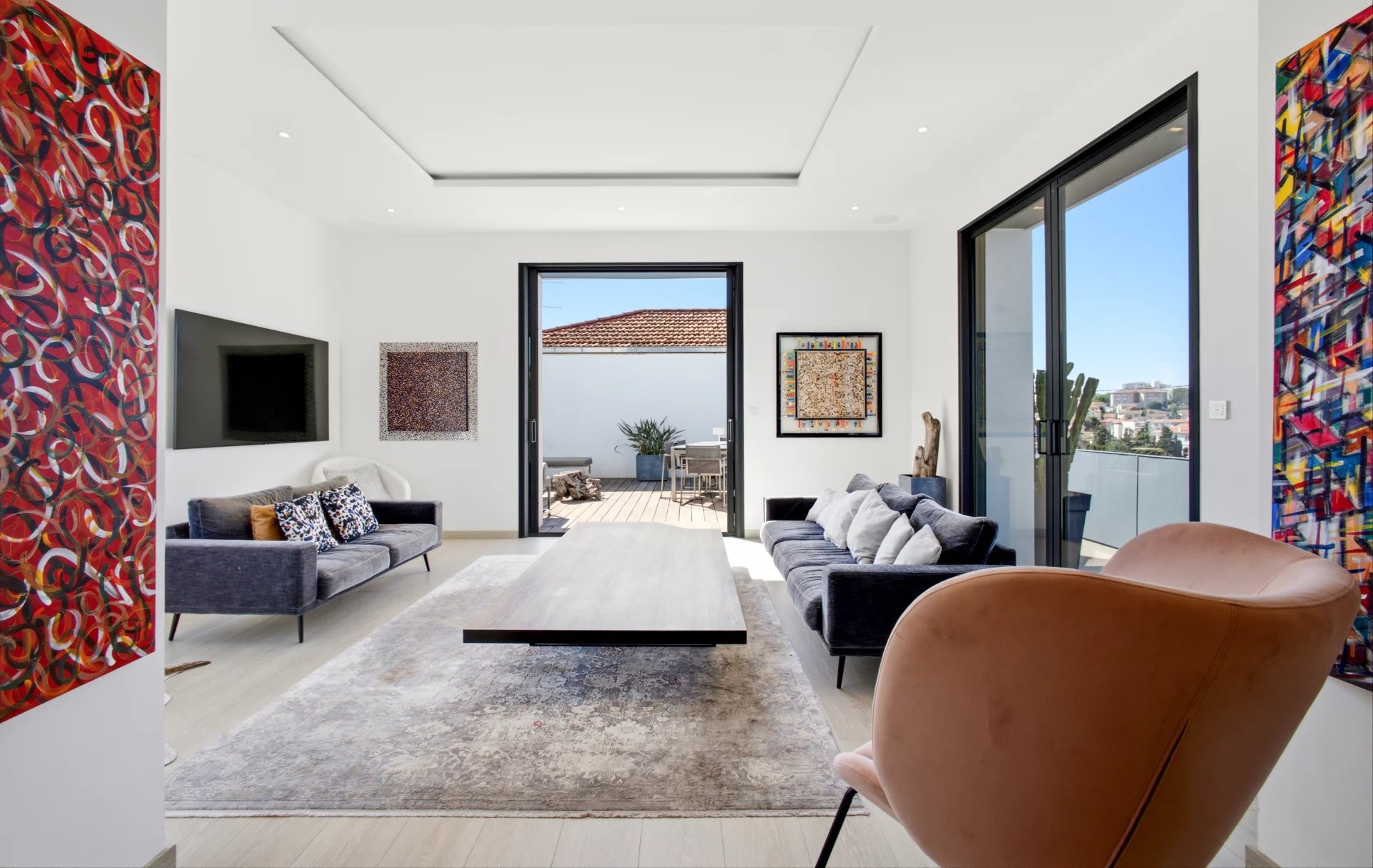 Interior of a villa in Petit Juas Interior of a renovated villa with modern living room and terrace in Cannes.