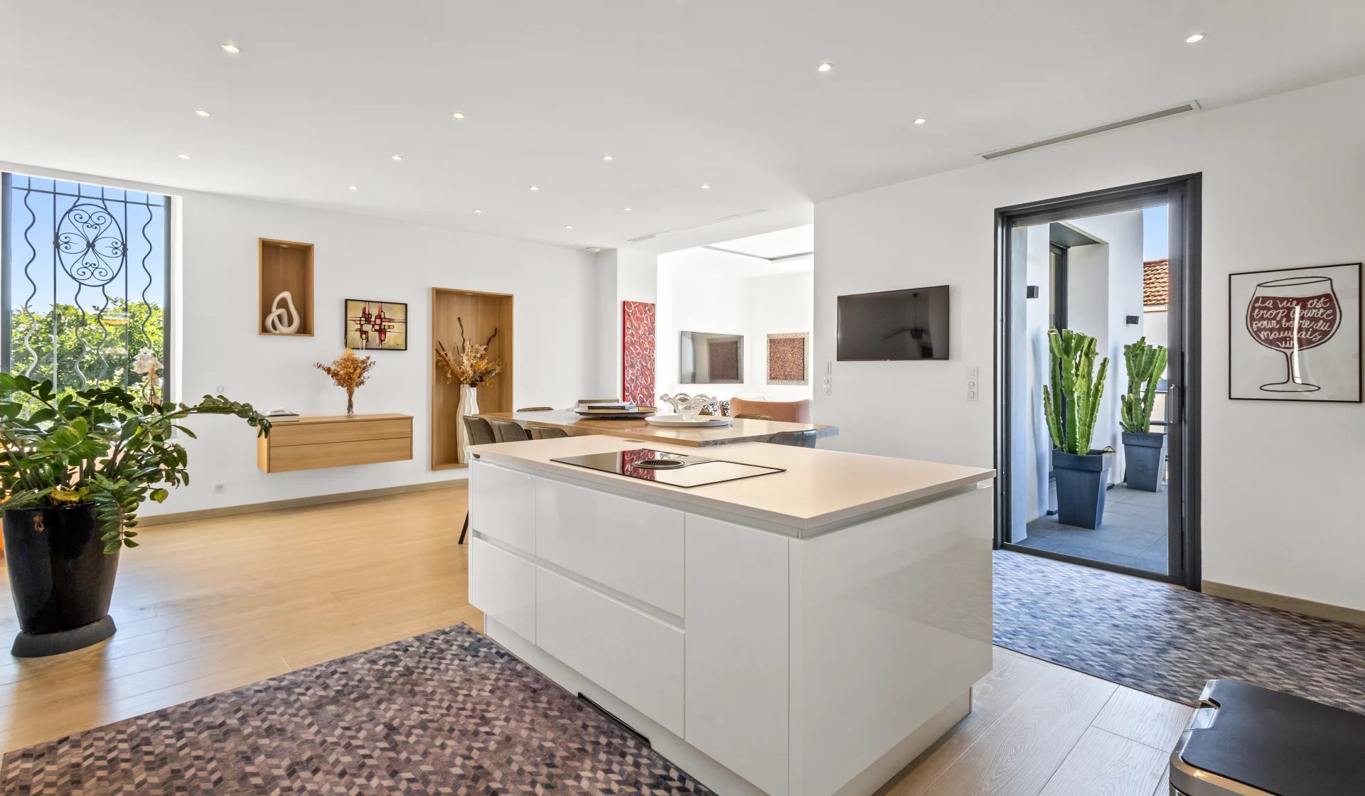 Interior of a villa in Cannes Interior of a renovated Belle Époque villa with open kitchen and bright space.