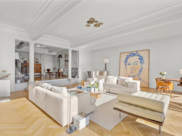 Interior of a renovated private mansion with a bright living room and modern decor.