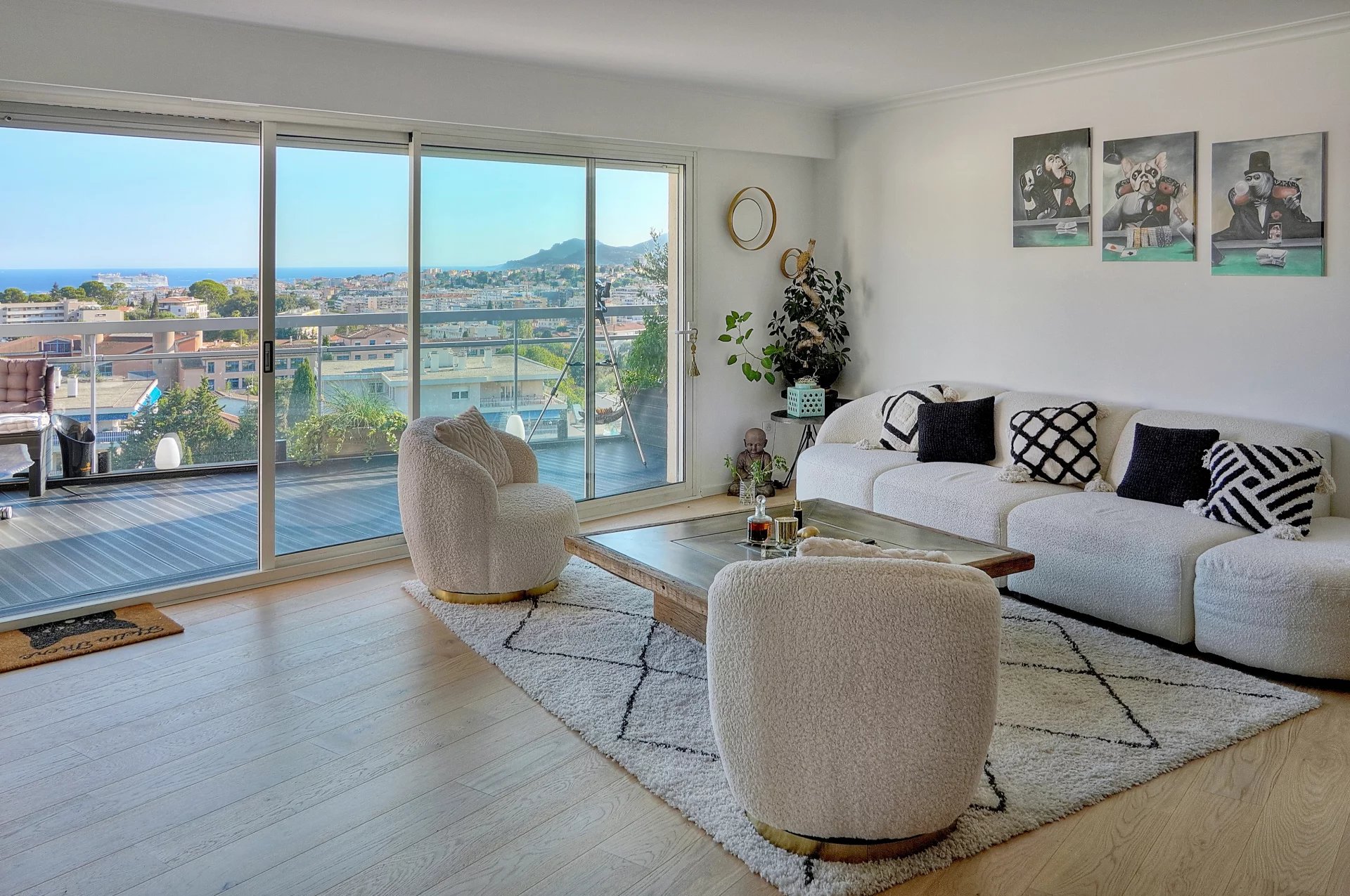 Bright living room with sea view, modern furniture and contemporary decor, Le Cannet.