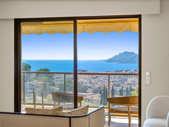 Panoramic view of the sea and Le Suquet from an apartment in Le Cannet.