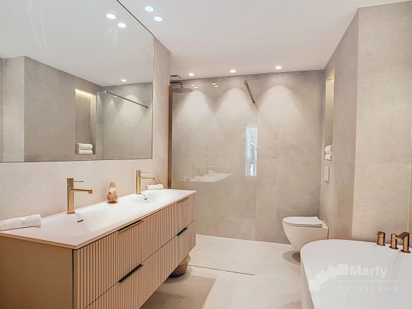 Modern bathroom with double vanity and walk-in shower